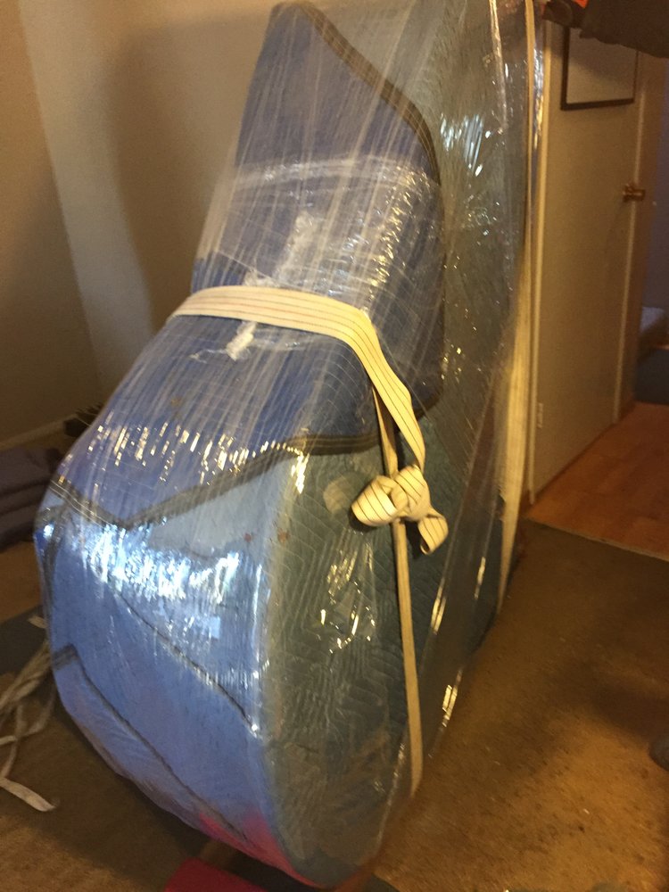 Furniture carefully wrapped for protection during moving